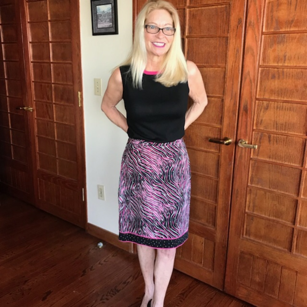 Black skirt with multi colored print.